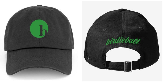 The BirdieBall Hat (Black Logo) is a classic green dad hat by BirdieBall, featuring a bold black "b" logo on the front and "birdieball" in green script on the adjustable back strap.