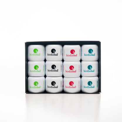 The BirdieBall Turf Set includes 12 limited flight practice golf balls, each with the BirdieBall logo in assorted colors, plus hitting turf—perfect for backyard golf training.