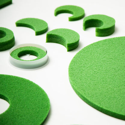 BirdieBall Contour/Break Shims & Challenging Hole Reducers let you create breaks and contours for golf practice, using green foam shapes—perfect for putting green setups.