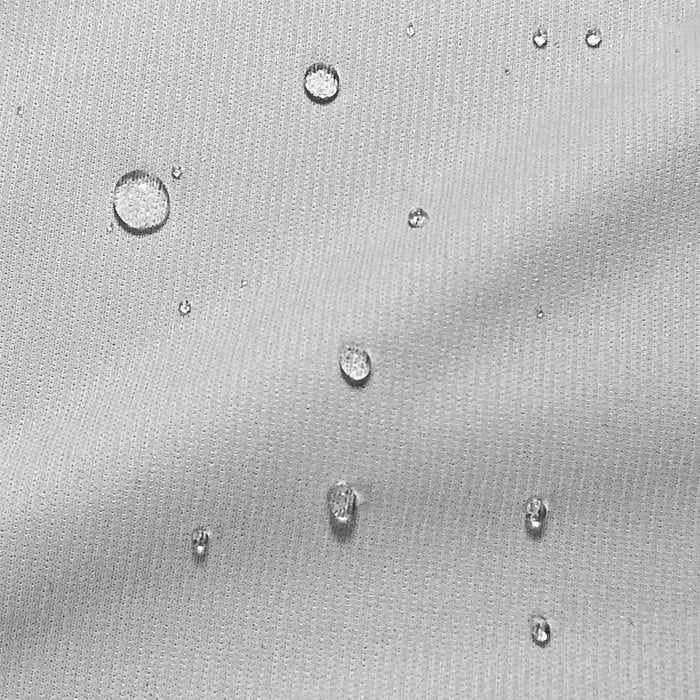Close up of water resistant white mattress protector