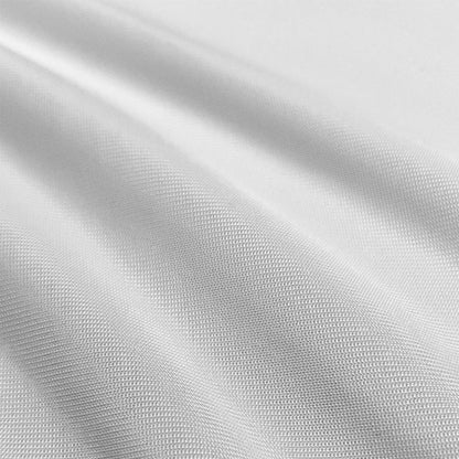 Close-up of white fabric with subtle texture