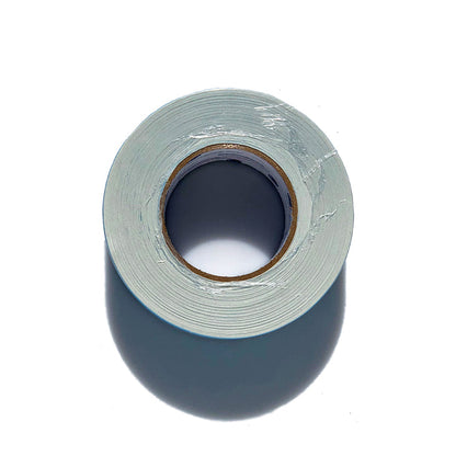 A roll of BirdieBall Double Sided Assembly Tape is shown on a white background with a shadow below—ideal for securely adhering putting green materials.