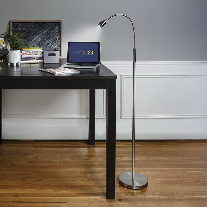 FOCUS Adjustable Beam Floor Lamp in a room setting