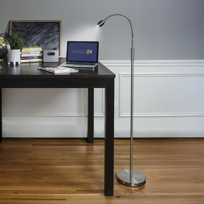 FOCUS Adjustable Beam Floor Lamp in a room setting