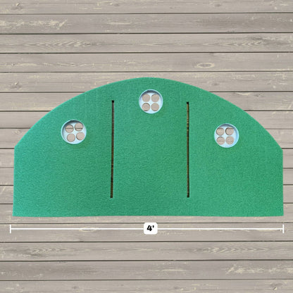 The BirdieBall Full Width Hole Deepening/Break Shim (for use with turf mats) is shown installed on a green semicircular putting surface with three golf holes, two black lines, and a 4-foot mark on the wooden floor below.