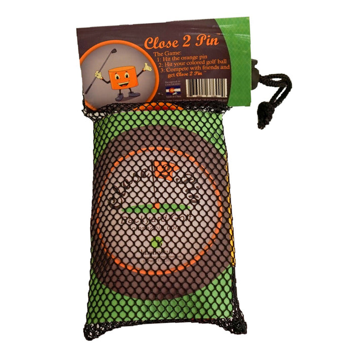 The BirdieBall Golf Chipping Game - Backyard Golf Game Close 2 Pin includes a target mat and colored balls in a mesh bag with game instructions, making it perfect for portable backyard or family fun.