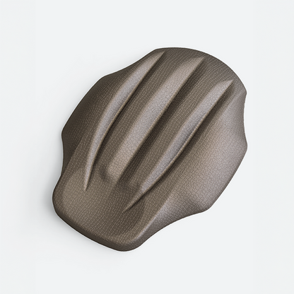 Brown textured object on a light gray background