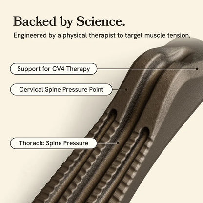 Close-up of a gray spine decompression stretcher with labeled pressure points on a beige background.