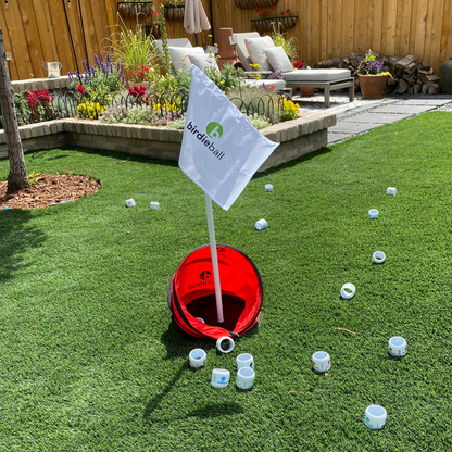 The BirdieBall Original Backyard Golf Game lets you set up multiple golf holes with flags on artificial grass—ideal for practicing your swing and aiming at precise targets right in your backyard.
