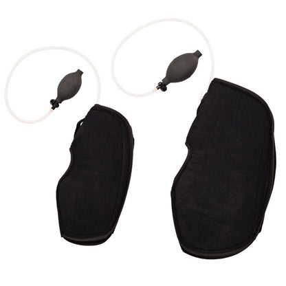 Two black knee suppports shown with small black pump bulb and clear tubing, photographed on a plain white background.