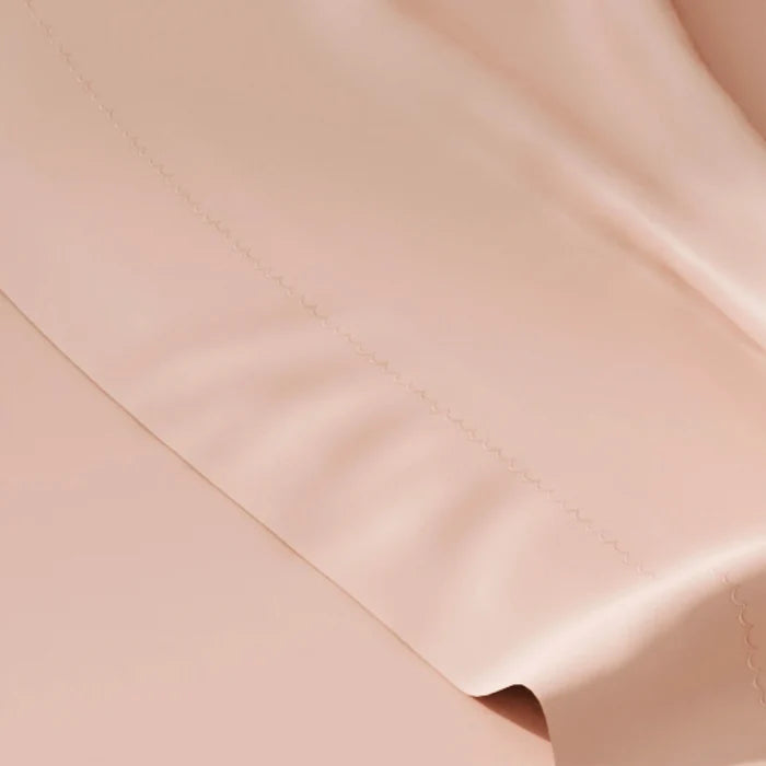 Close-up of beige fabric with a subtle texture